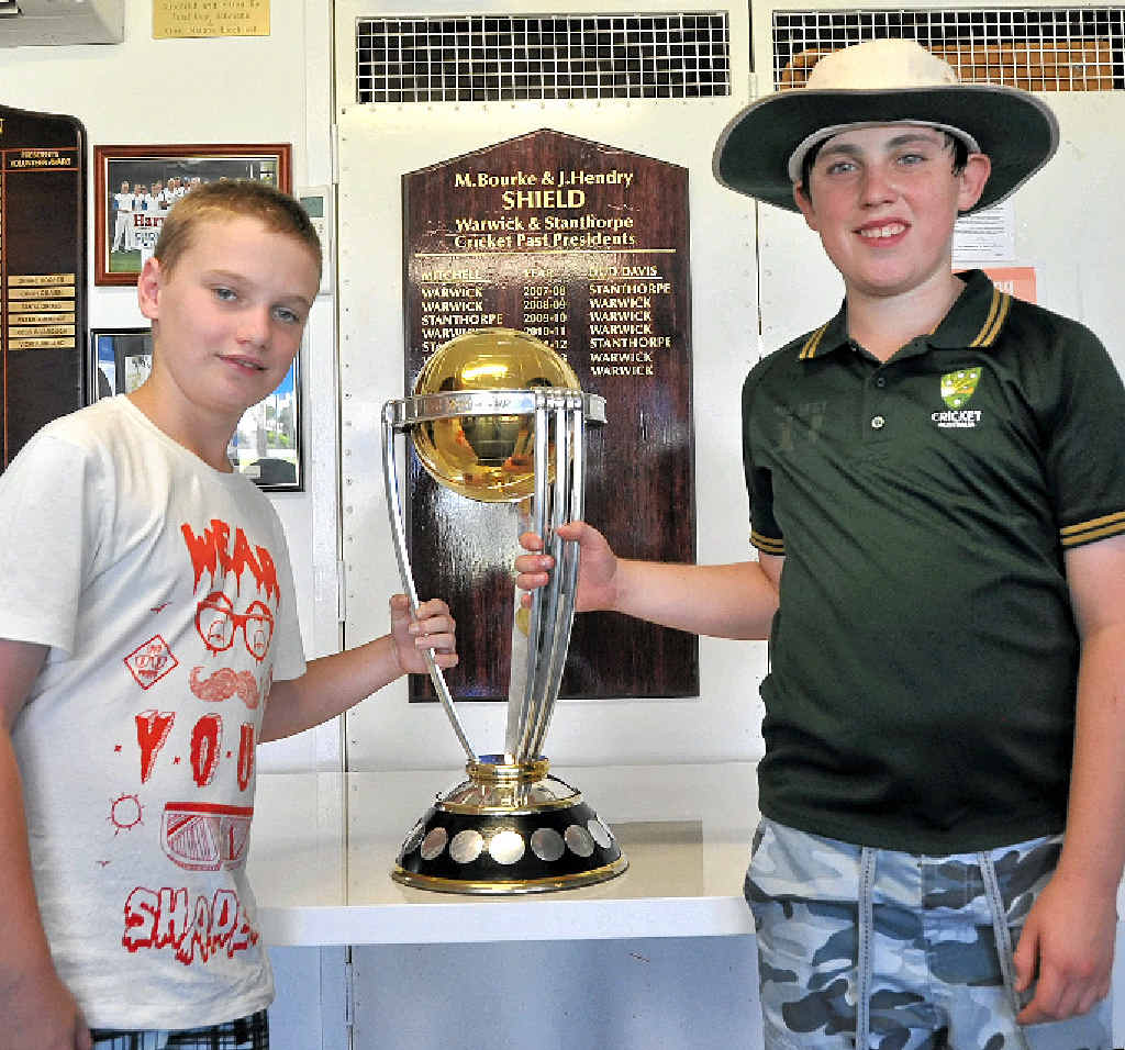 Blake Johnson and Nic Stephens take a look at the ICC Cricket World Cup trophy. Blake Johnson and Nic Stephens take a look at the ICC Cricket World Cup trophy.